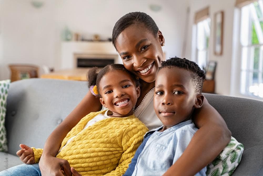 A mother with her children at home